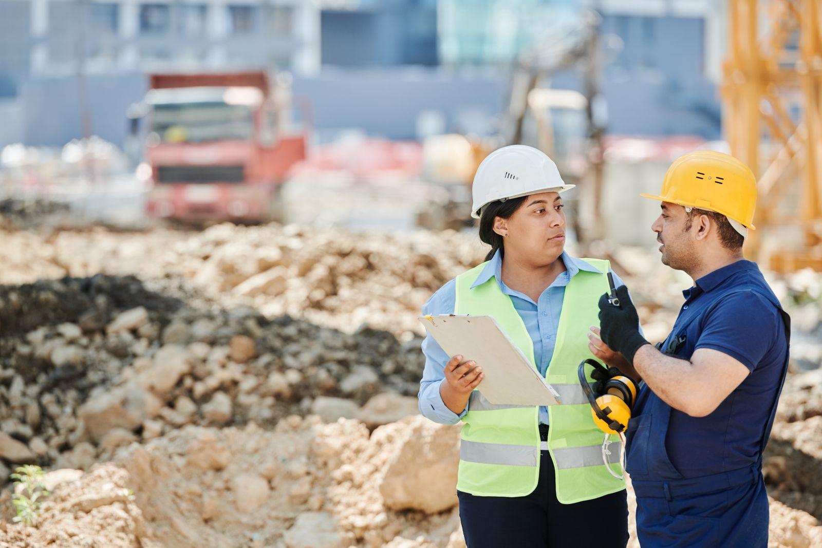 ApexWorks site lead reviewing a project on site