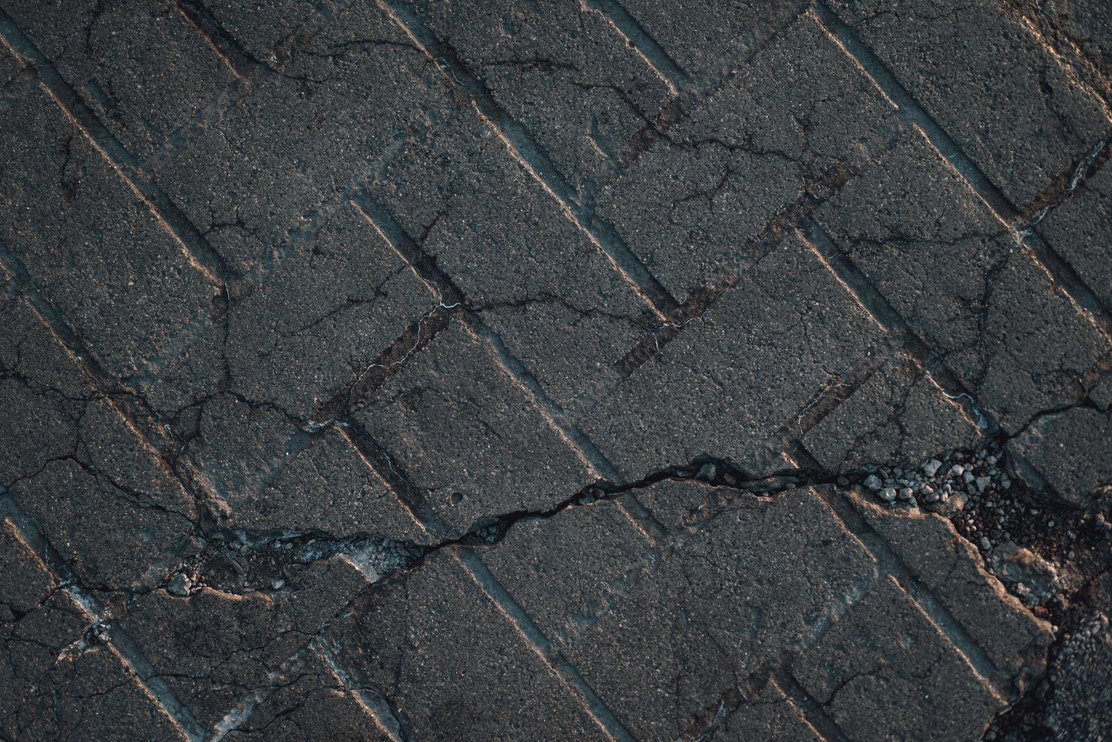 Cracked concrete, poor drainage
